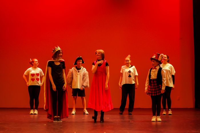 River (2nd from left) as the King of Hearts in Alice in Wonderland Jr, 2025